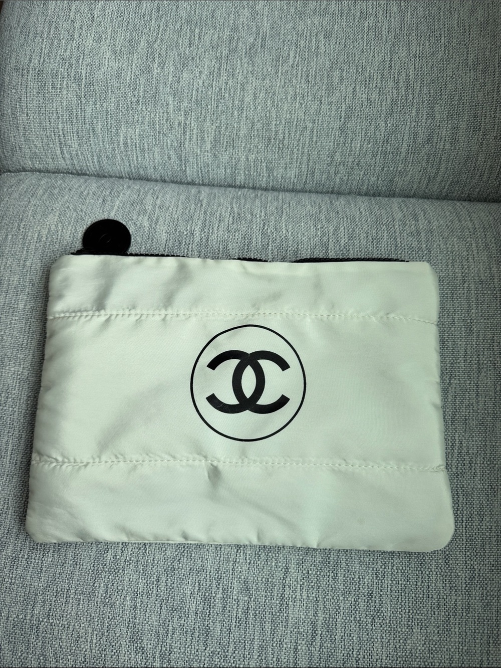 CHANEL Cream Quilted Pouch with Black Logo